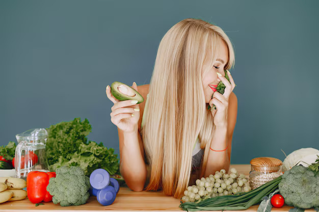 beautiful-girl-make-salad-sporty-blonde-kitchen-woman-with-avocado_1157-41857