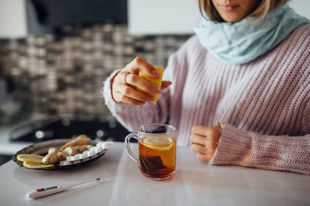 female-hands-squeezing-lemon-her-tea_496169-109