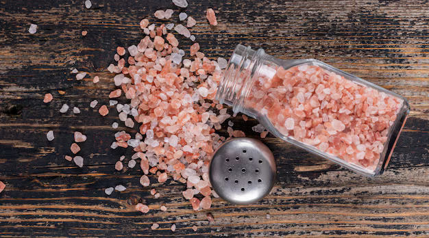 himalayan-salt-coming-out-open-salt-shaker_176474-1598